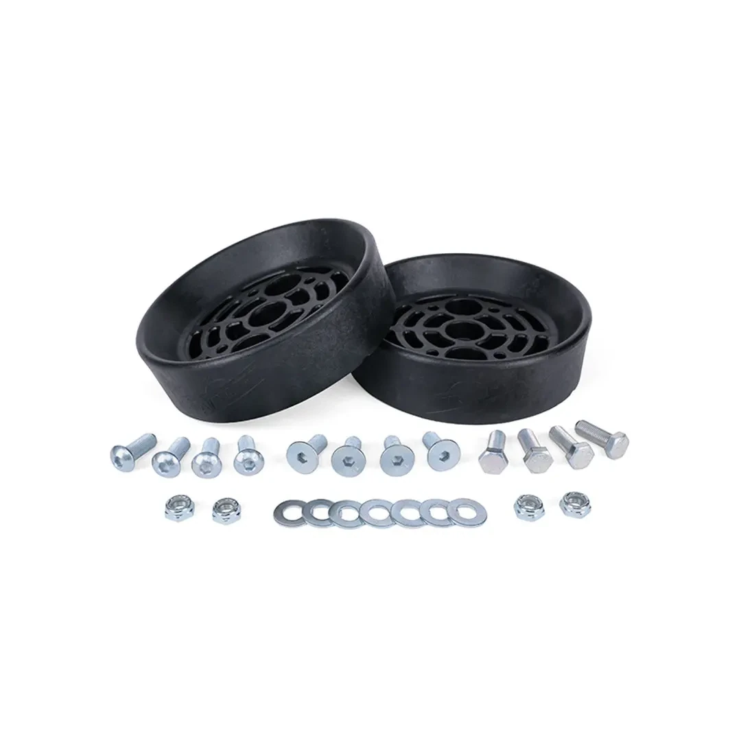 Two black rubber gaskets with screws and washers on a white background