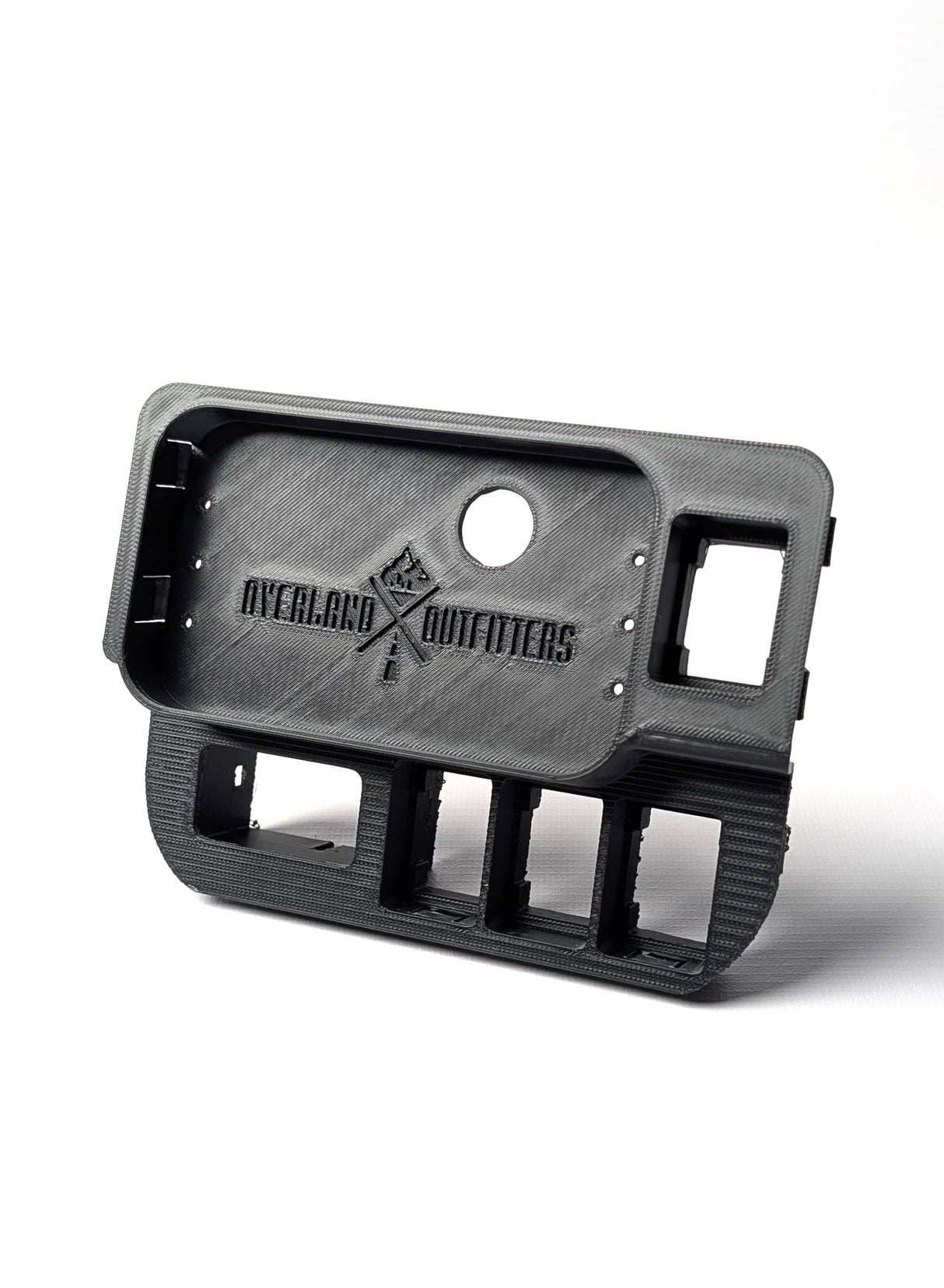 Angled side view of a black panel with 'Overland Outfitters' logo on a white background