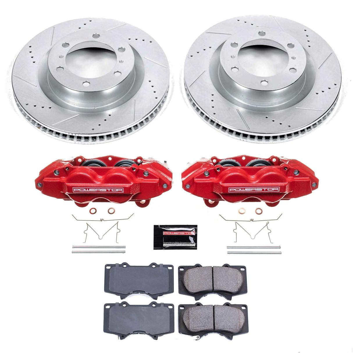 Brake disc rotors, red calipers, and brake pads on a white background