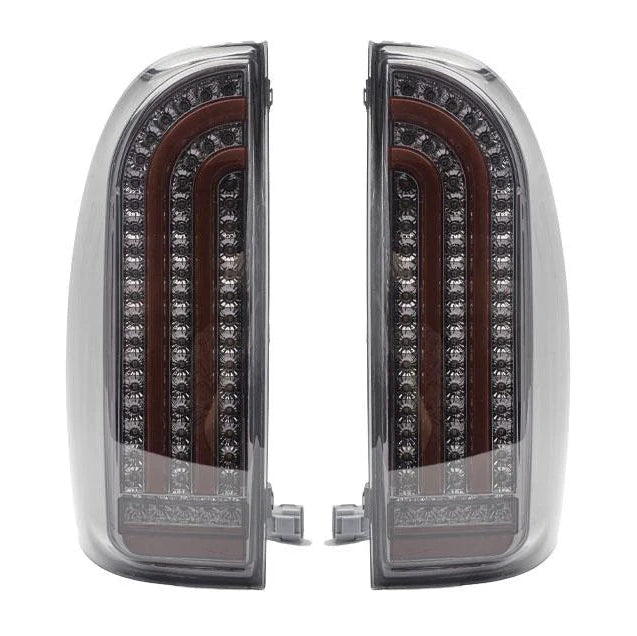 Pair of LED tail lights with chrome accents on a white background