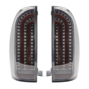 Pair of LED tail lights with chrome accents on a white background