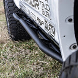 Close up of slider displayed on white truck parked on grass