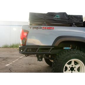 Back of a truck with 'TRD 4x4 Off Road' branding and a black cargo bag.