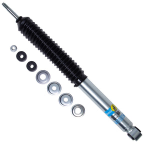 Black and silver Bilstein shock and spacers on white background