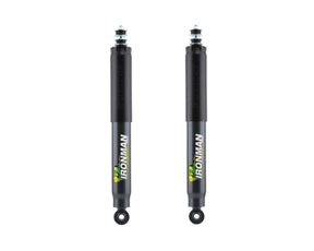 Two black Ironman suspension shock absorbers shown side by side on a plain white background.