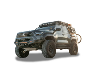 Toyota truck with off-road modifications on a white background