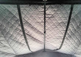 Quilted fabric with a diamond pattern on a black background