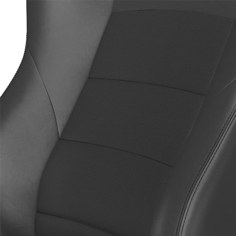 Close-up of a car seat with a textured black cover