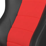 Close-up of a red car seat cover with black leather sides on a white background