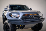 Blue Toyota truck with lifted suspension on a gray background