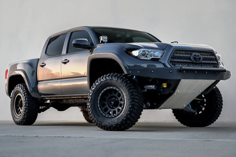 Toyota truck with lifted suspension on a gray background