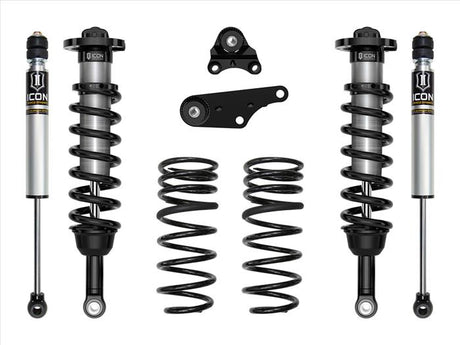 Set of suspension components including shock absorbers and springs on a white background