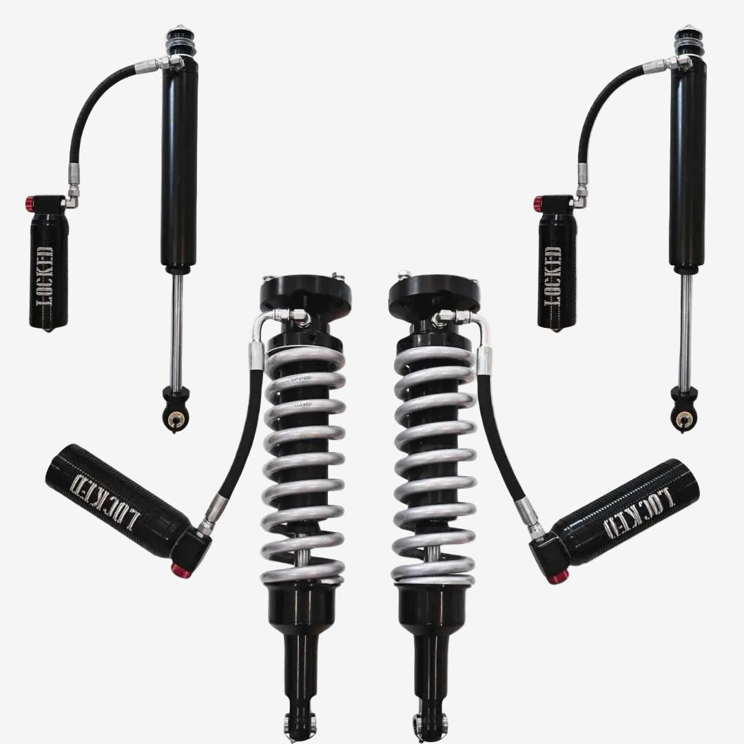 Set of shock absorbers with springs on a white background.