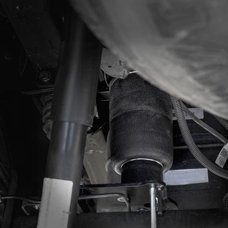 Close-up of a car's air suspension system.