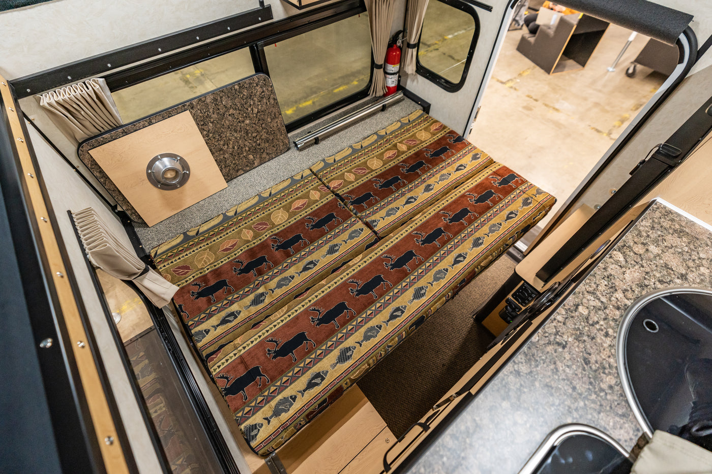 FOUR WHEEL CAMPERS RAVEN SLIDE-IN CAMPER