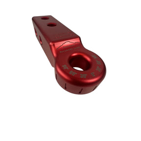 Red metal recovery ring on a white background