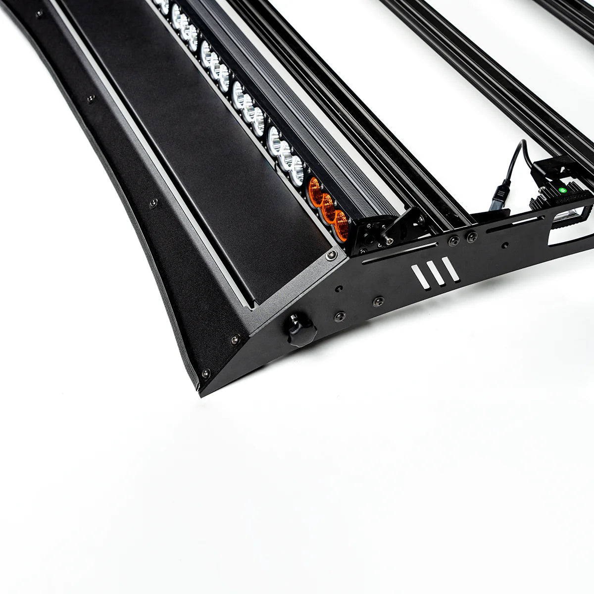 Close-up of a roof rack with lights on a white background