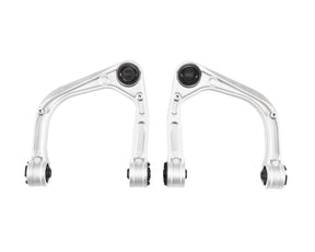 Two metal suspension control arms on a white background