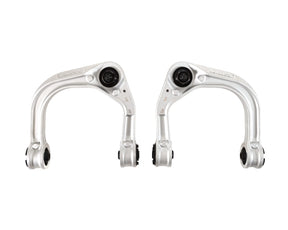 Two silver control arms on a white background