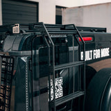 Black SUV and ladder with Westcott Designs branding.