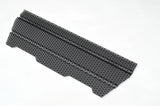 Rectangular black mesh grille with textured surface on a white background