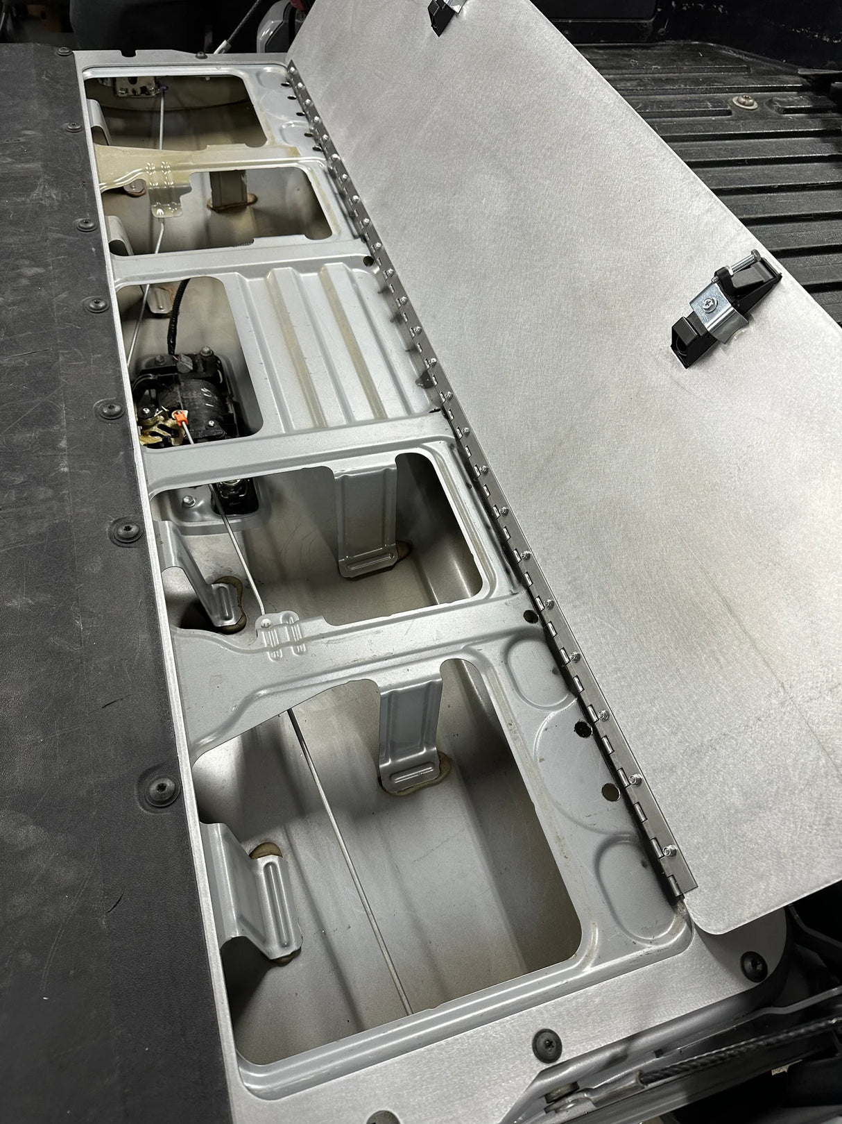 Gray plastic mold on a black surface