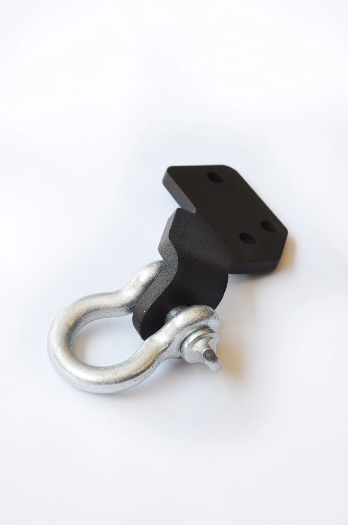 Metal shackle with black steel fitting on a white background