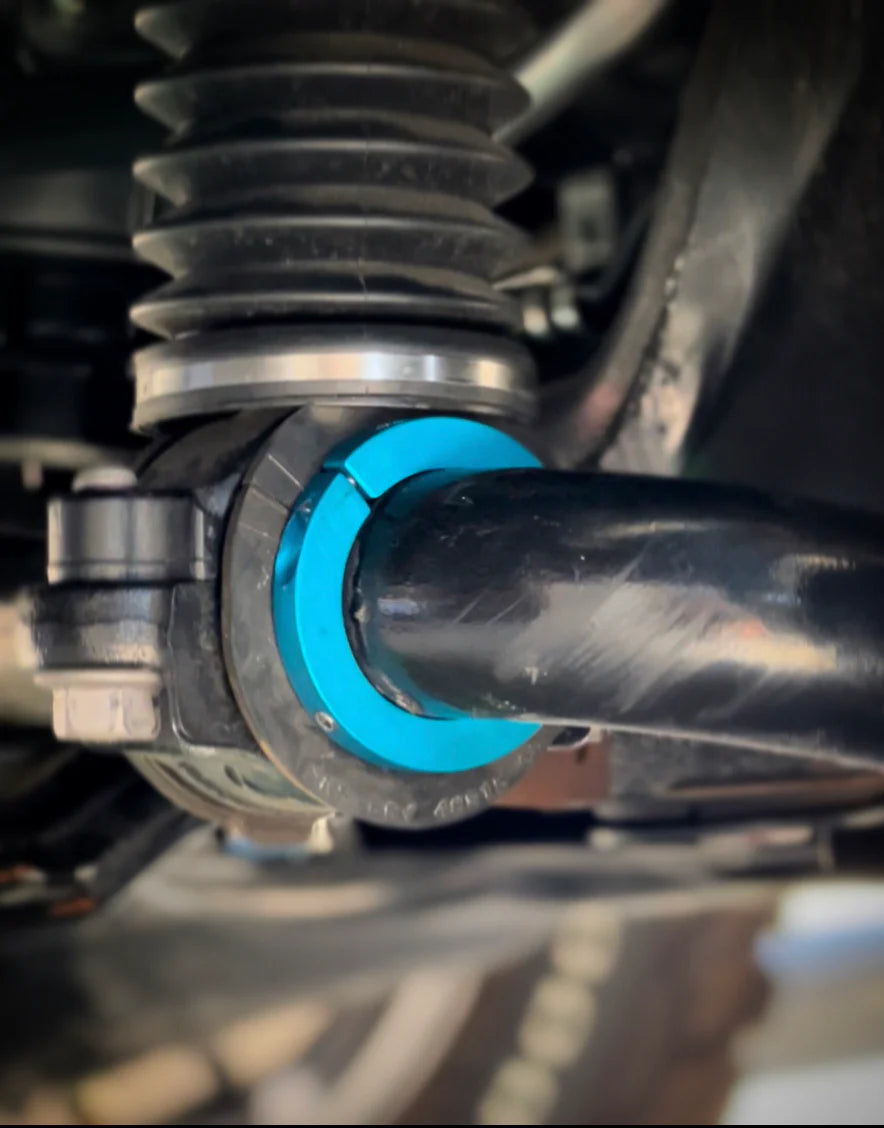 Close-up of mechanical component with a blue ring