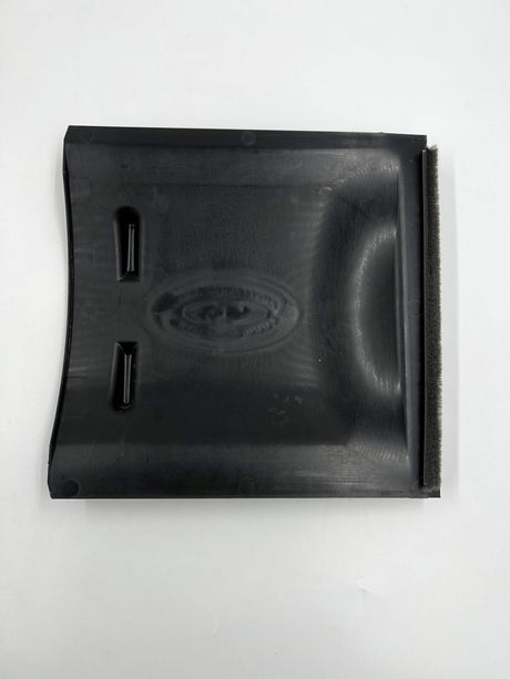Black plastic component with branding on a white background