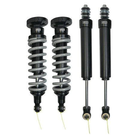 Two pairs of shock absorbers on a white background