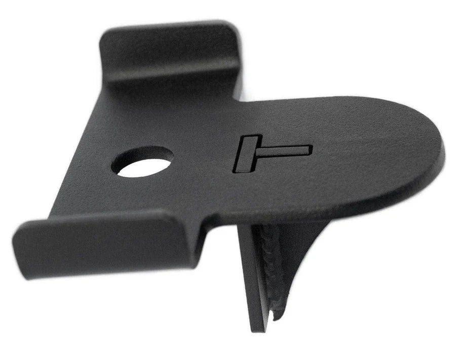 Black metal bracket with a hole and protruding tab on a white background