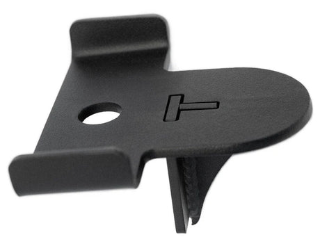 Black metal bracket with a hole and protruding tab on a white background