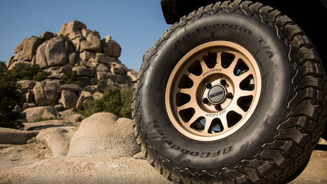 Off-road tire with 'BFGoodrich' branding on a rocky terrain