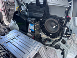 Open car panel revealing electrical components