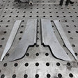 Metal components on a perforated metal surface