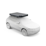White car with a black roof box on a white background