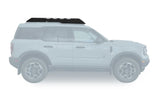 SUV with a roof rack on a white background