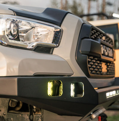 FNG Pods installed on a Tacoma front bumper