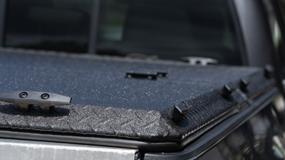 Tie-down cleats on a DiamondBack tonneau cover 